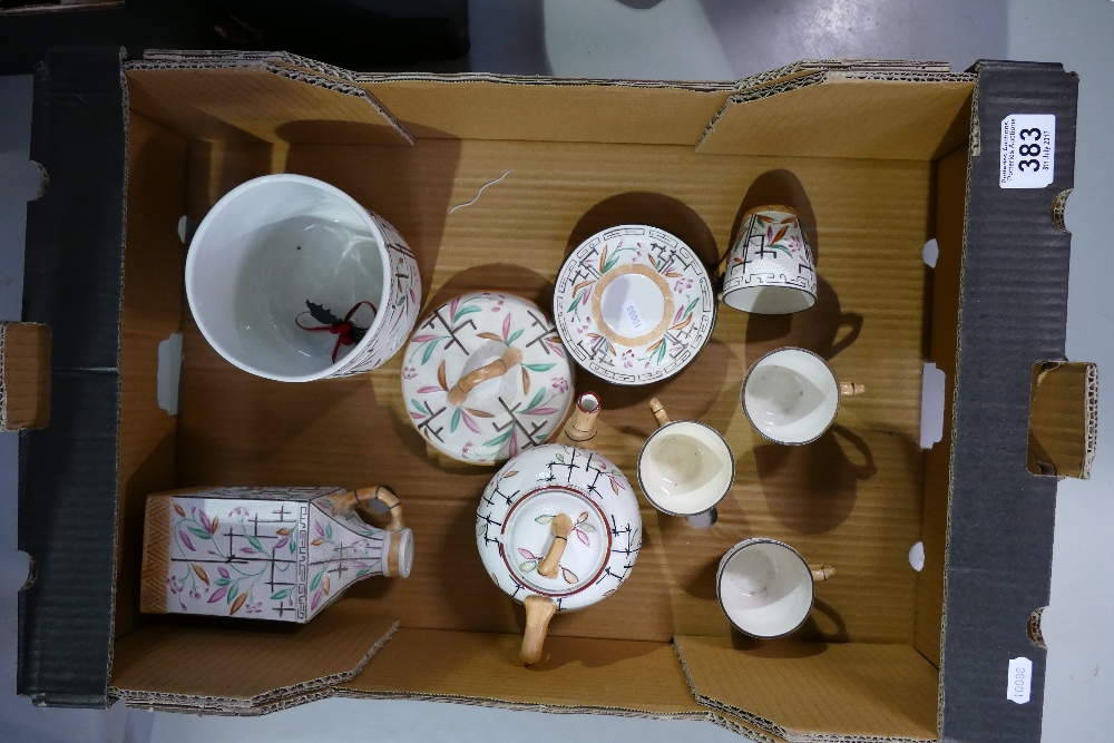 A collection of unmarked ironstone items decorated in oriental bamboo decoration to include biscuit