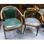 Two captains chairs one with a green leather seat and one grey leather seat (2)