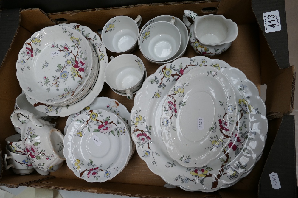 A collection of Booths Chinese Tree patterned dinnerware to include plates, cups, saucers,