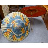 A pair of oriental bamboo stemmed parasols (2)