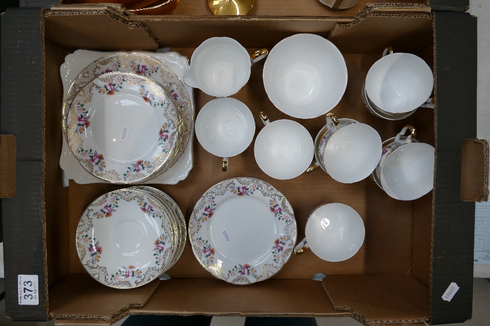 A collection of decorative china teaware with floral decoration to include cups, saucers,