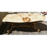 Shaped marble topped brass coffee table