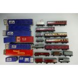 A collection of Hornby Dublo carriages and wagons to include 32096 D13 carriages, D20 carriages,