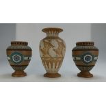 Doulton Lambeth Stoneware pair of vases (height 17cm) and similar vase (24cm) (3)