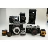 A collection of camera equipment to include Leitz Wetzlar Leicaflex with Wetzlar Summicron 1:2/50