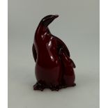 Royal Doulton Flambe model of a Penguin and chick signed Noke,