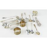 A collection of various hall marked Silver items including spoons and serviette rings (weight 310.