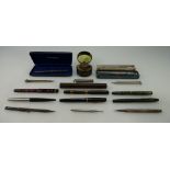 A collection of vintage fountain pens and silver propelling pencils by Sheaffer, Onoto, Parker,