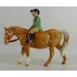 Beswick boy with green jacket on palomino horse 1500