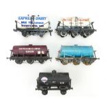 A collection of O Gauge Model Locomotive carriages including varieties of tankers (5)