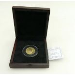 United States 1910 gold ten dollar coin with Indian head, cased in plastic,