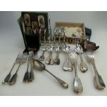 A collection of various items including vintage stamps, EPNS toast rack,