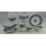 A collection of Wedgwood tea and dinner ware in the Florentine pattern to include cups, saucers,