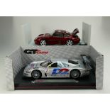 A collection of toy cars to include Maisto model racecar 1:18 Mercedes CLKLM and UT models model