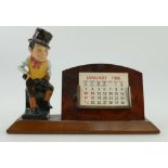 Royal Doulton Dickens figure mounted on wood calender base