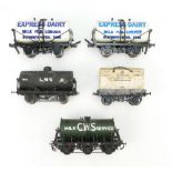 A collection of O Gauge Model Locomotive carriages including varieties of tankers (5)