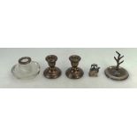 A collection of Silver items including ring tree holder, glass match striker,