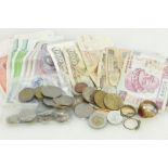A collection of various currency including foreign bank notes, coins, 14k rolled gold rings,