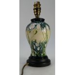 Moorcroft lampbase decorated in the Snowdrop design on wood base,