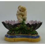 Minton Majolica double sweetmeat dish moulded with two kissing cherubs,