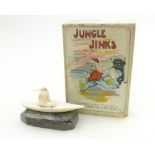 Early card game Jungle Jinks by Thomas De La Rue and Inuit carving of Eskimo on stone base (2)