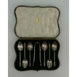 Cased Set of Six Silver Apostle Tea Spoons and Tongs, Birmingham 1907, 131.
