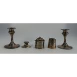 A collection of silver items to include Silver candlesticks, inkwell,