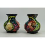 Moorcroft pair small vases decorated in the Queens Choice design, height 10cm,