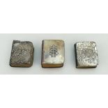 A collection of miniature Silver mounted books,