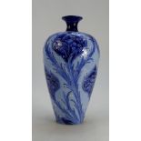 William Moorcroft Macintrye Florian vase decorated in the blue poppy design,