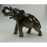 Royal Doulton model of an elephant with trunk in salute, in natural colour,