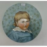 19th Century hand painted pottery plaque of a young man ''Claud'', label to reverse ''Howell & James