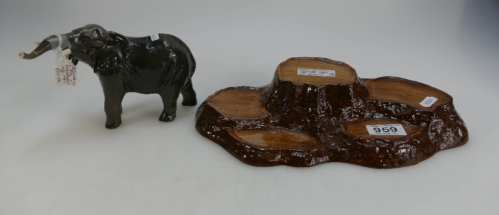 Beswick Elephant with trunk stretched 974 (tusk broken) and tree trunk stand (2)