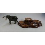 Beswick Elephant with trunk stretched 974 (tusk broken) and tree trunk stand (2)