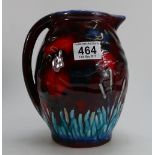 Anita Harris bullrush on burgundy ground jug, height 20cm.