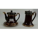 Continental Glazed terracotta teapot and stand together with similar pewter topped jug(damaged)(3)
