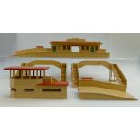 A collection of Hornby Dublo diecast station accessories to include large station and platform,