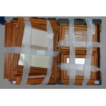 A large collection of unmounted hardwood picture frames, approximately 20. (2 Trays).