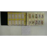 A collection of cigarette cards to include Album and Slipcase a set of 7 cards;