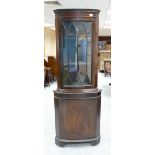 Inlaid Mahogany corner unit with glazed glass door.