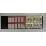 A collection of cigarette cards to include album and three sets transfers,