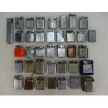 A collection of collectable butane and gas cigarette lighters to include Polo, Beney, Tommy,