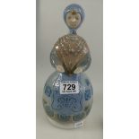 lladro figure in the style of a Russian doll,