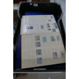 A collection of stamps to include first day covers, presentation packs and two albums of stamps.
