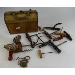 a collection of various corkscrews, Huntly & Parmer suitcase biscuit tin,