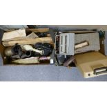 A mixed collection of items to include early Bakerlite type telephone, cased radio sets,