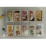 A collection of cigarette cards to include 8 Brooke Bond tea, Famous people 1973, Wild Flowers 1955,