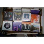 A collection of cased audio reel to reel tapes,