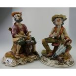 A pair of Capodimonte style damaged figu