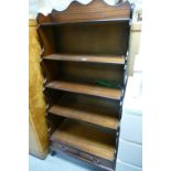 A reproduction Mahogany waterfall display cabinet with an oak dresser. (2)